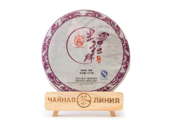 Pressed Rip Pu-erh Tea - Shu pu-erh 2014 "Vekha" brand "Pagoda" from the "Liming" plant, cake 357 g.