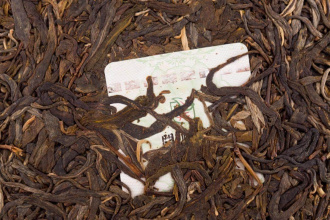 Pressed Raw Pu-erh Tea - Sheng pu-erh 2018 "Jingmai" brand "Kaishunhao" 200 g, 