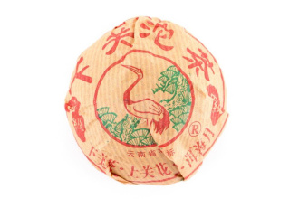 Pressed Raw Pu-erh Tea - Sheng pu-erh 2006 "Premium grade" of the "Pine and Crane" brand from the "Xiaguan" plant, 100 g, 