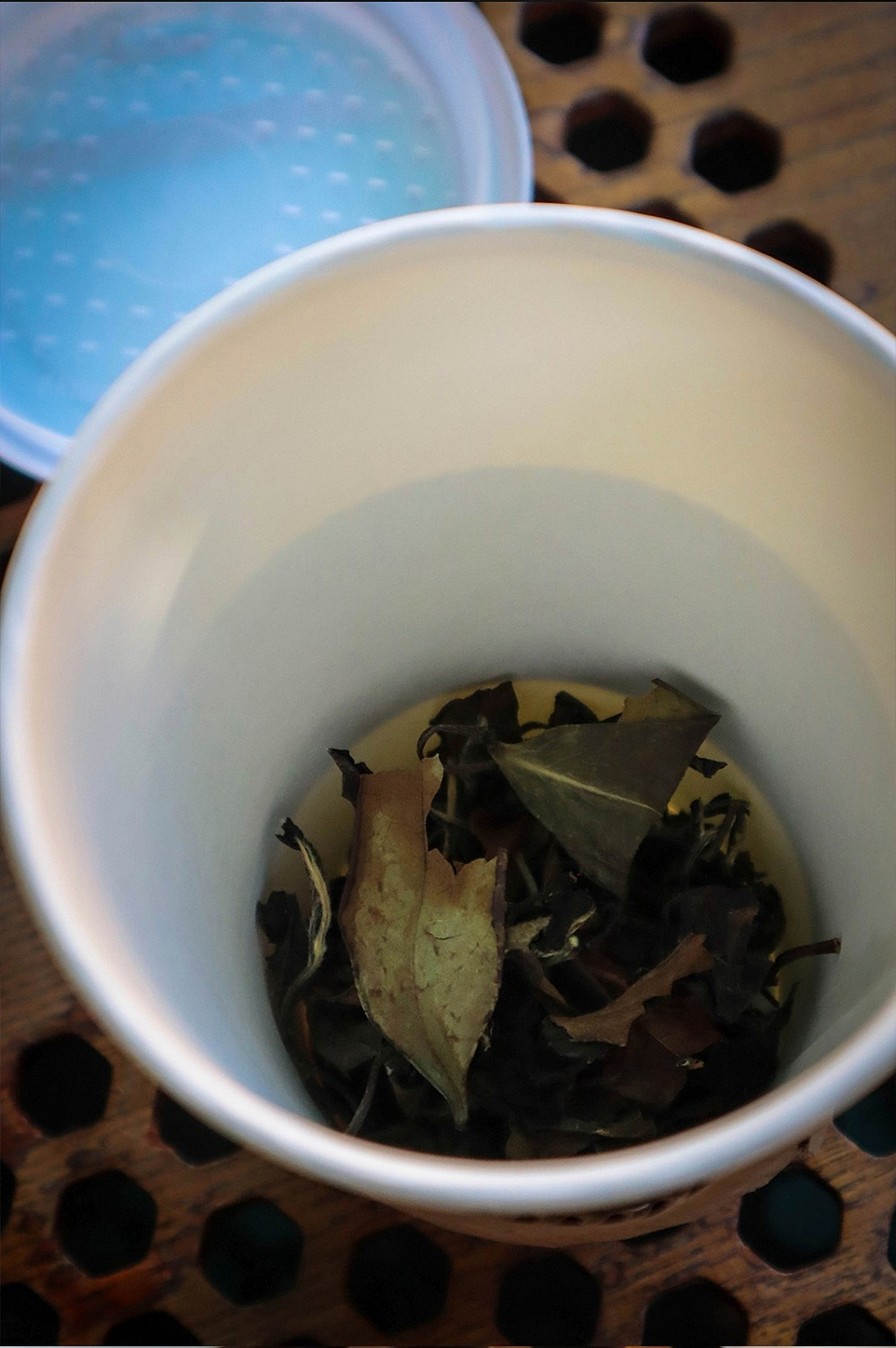 Tea to go in a glass with a strainer