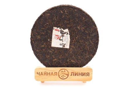 Pressed Raw Pu-erh Tea - Sheng pu-erh 2014 "Mountain Melody" of the "Pine and Crane" brand from the "Xiaguan" factory, cake 357 g, 