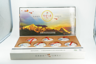 Pressed Rip Pu-erh Tea - Коллекционный набор шу пуэров 2011 г. "Юг цветных облаков" завода "Сад дракона" 7 блинов по 100 гр., 