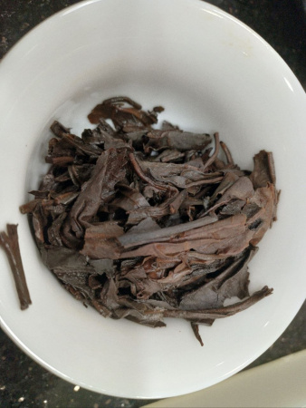 Pressed Raw Pu-erh Tea - Шэн пуэр 2003 года "Зелёная марка" CNNP 357 г, 
