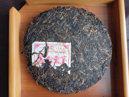 Pressed Raw Pu-erh Tea - Sheng Pu'er 2007 "Dragon Traveling the World" by "Dragon Garden" brand, 400 g, 