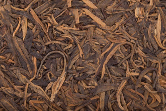 Pressed Raw Pu-erh Tea - Sheng pu-erh 2009 "Laobanzhang" from the Banzhang Lao Zhai factory, 357 g of bingcha, 