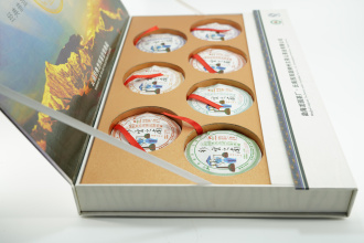 Pressed Rip Pu-erh Tea - Коллекционный набор шу пуэров 2011 г. "Юг цветных облаков" завода "Сад дракона" 7 блинов по 100 гр., 