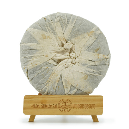 Pressed Raw Pu-erh Tea - Sheng pu'er 2002 "International Pu'er Tea Exhibition" of the Tai Lian factory, 400 g, 